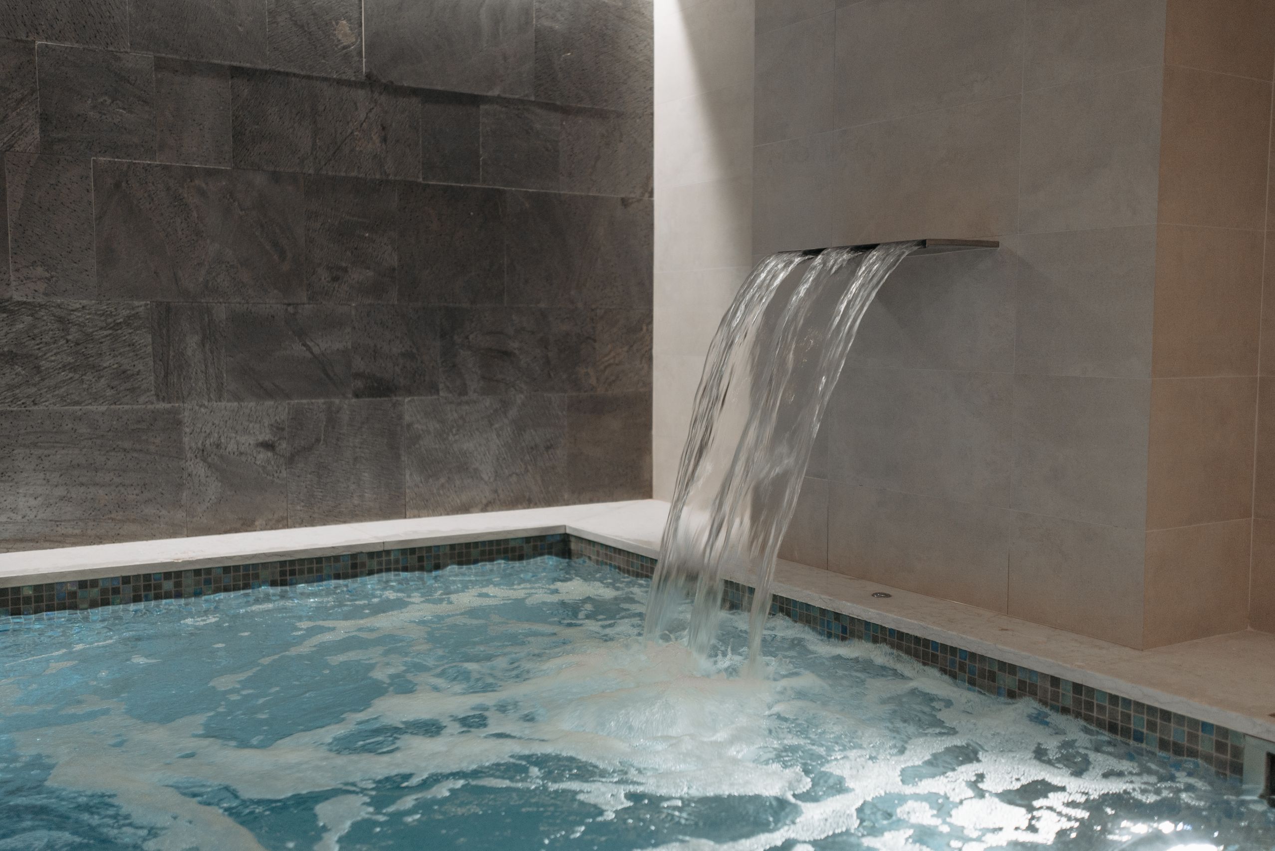 Spa interior with stone wall